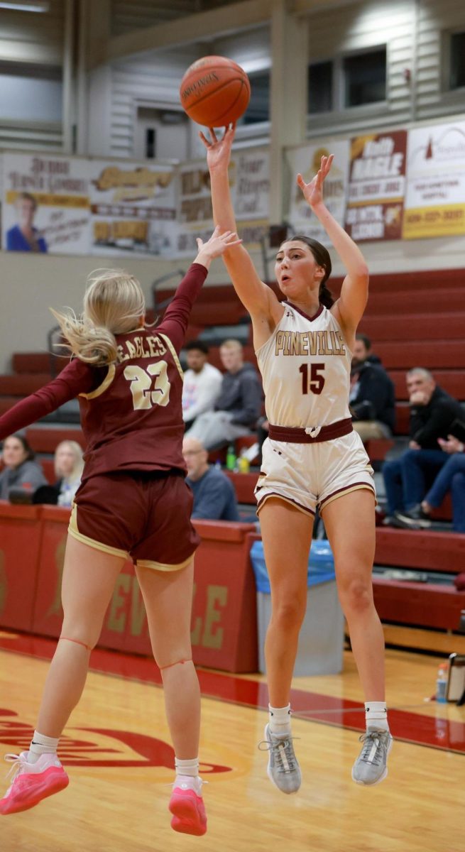 Pinevilles Ava Arnett put up a shot in the Lady Lions 69-59 win over visiting Leslie County to open the regular season.