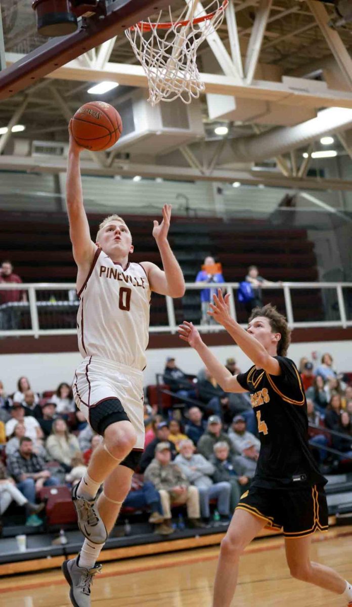 Pineville guard Sawyer Thompson went up for two of his 32 points Tuesday in the Lions loss to visiting Clay County.