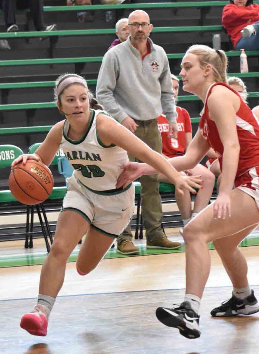 Harlan senior guard Emma Owens drove to the basket in Saturdays game against Belfry. Owens scored 27 points, including her 1,000th career point in the first half, to lead the Lady Dragons to a 78-57 victory.