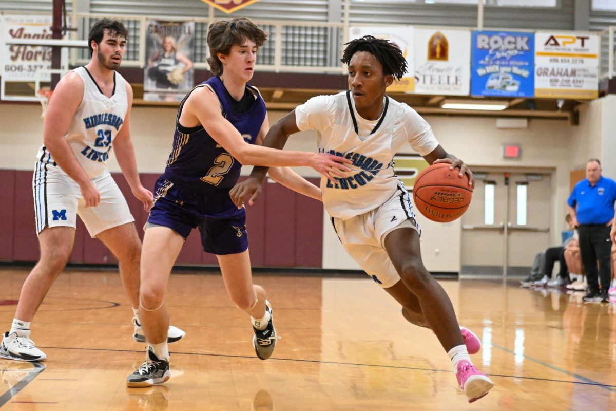 Middlesboro guard Jerimah Beck drove by a Somerset defender on Thursday in action from the Chain Rock Classic. Beck scored 12 points in the Jackets 61-57 loss.