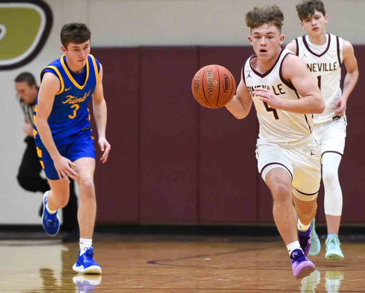 Pineville guard Kaiden Robbins raced down the court during the Lions win over Trimble County on Thursday in the Chain Rock Classic.