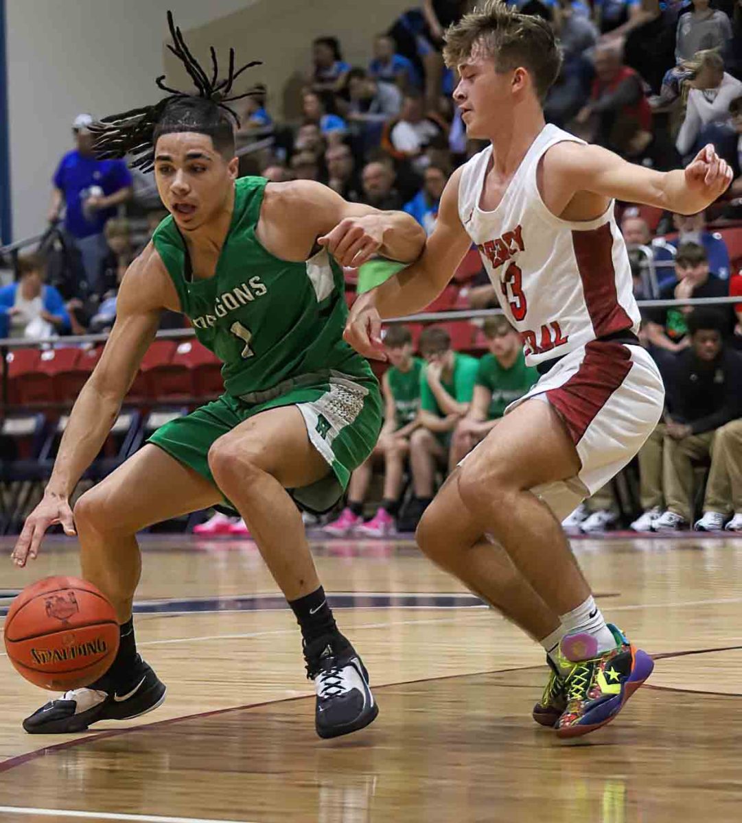 Harlan guard Kyler McLendon, pictured in action earlier this season, scored 44 points on Wednesday as the Green Dragons downed Wayne County in double overtime.