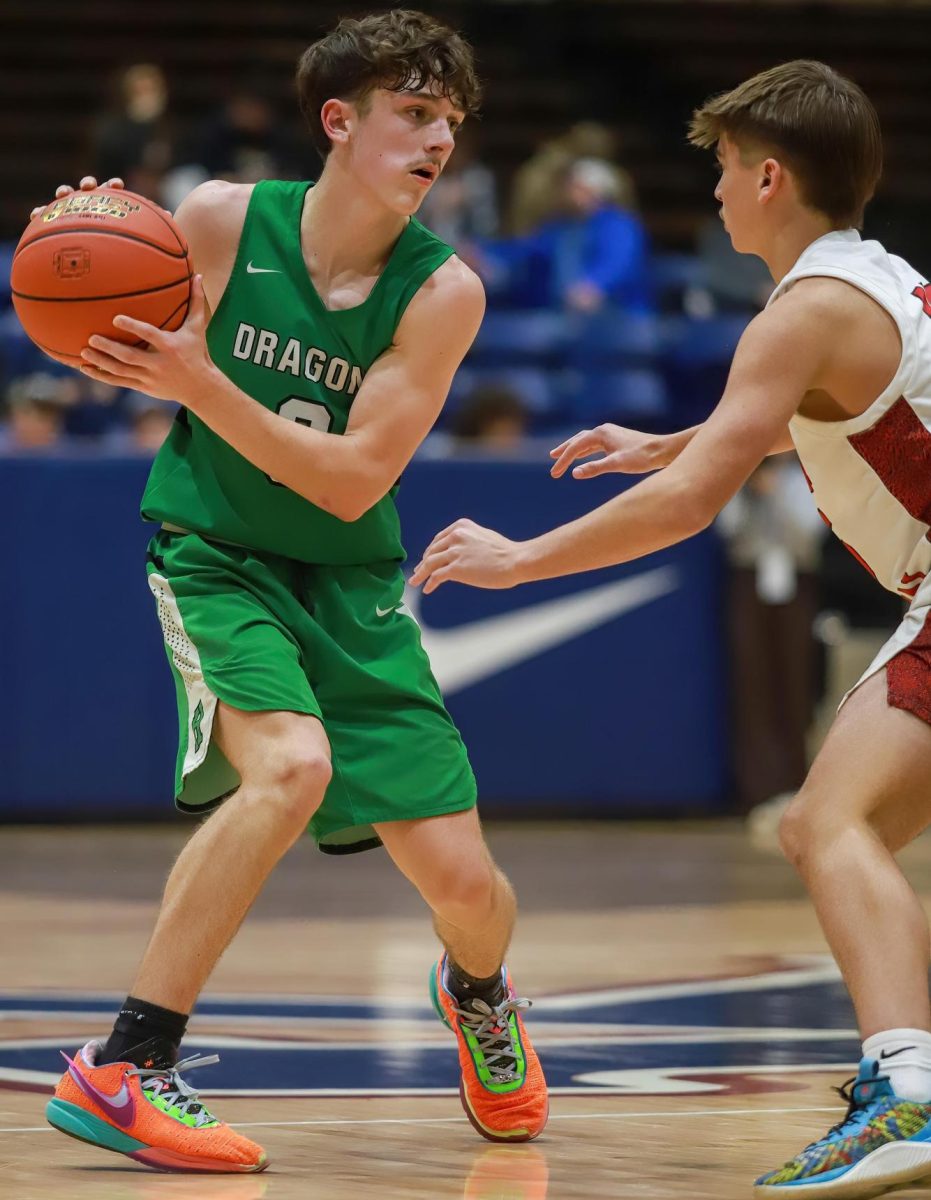 Harlan guard Trent Cole scored 18 points Thursday in the Green Dragons 75-70 loss to Mason County in the Dribble Drive Challenge at South Laurel.