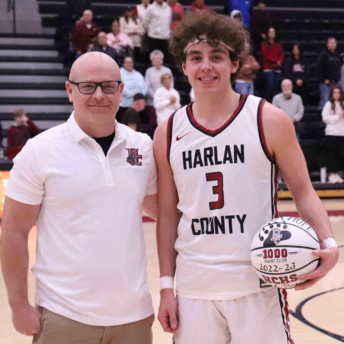 Harlan+County+junior+guard+Maddox+Huff+was+honored+before+the+Bears+game+Saturday+against+Ashland+Blazer+for+joining+the+schools+1%2C000-point+club+in+last+years+13th+Region+Tournament.+Huff+is+pictured+with+HCHS+coach+Kyle+Jones.