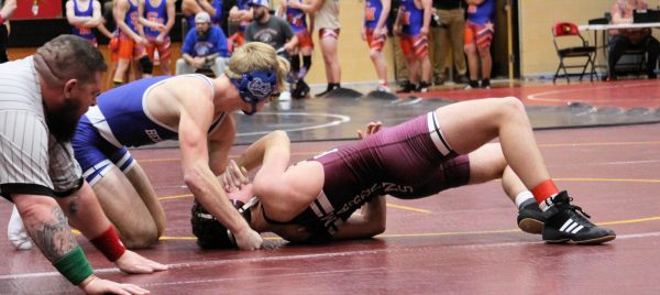 Bell County’s Hayden Canady earned his 200th win with a victory over Pulaski County’s Boone Godby in the Border Wars meet at Wayne County.