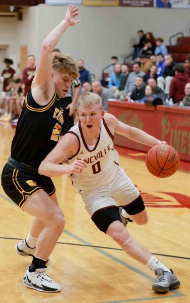 Pineville guard Sawyer Thompson, pictured in action earlier in the week against Clay County, scored 21 points Saturday in the Lions win over Scott County.