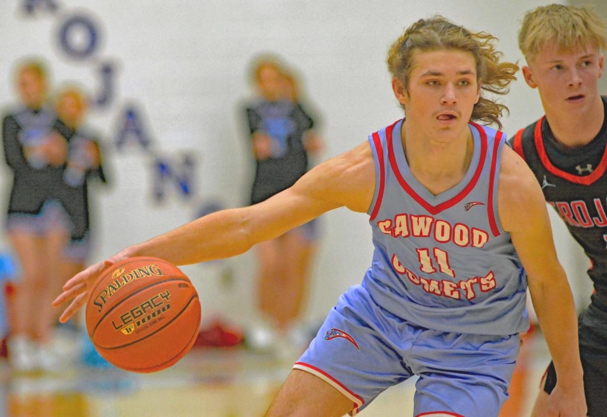 Cawood guard Brady Smith worked against James A. Cawood pressure on Thursday in a seventh- and eighth-grade showdown at JACES.