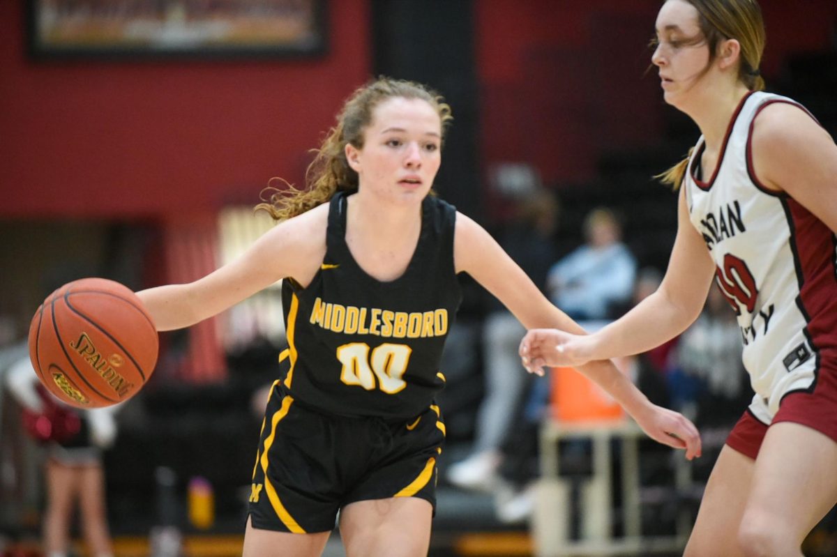 Middlesboro guard Morgan Martin worked down the court against Harlan Countys Faith Hoskins in a district clash Friday at HCHS.