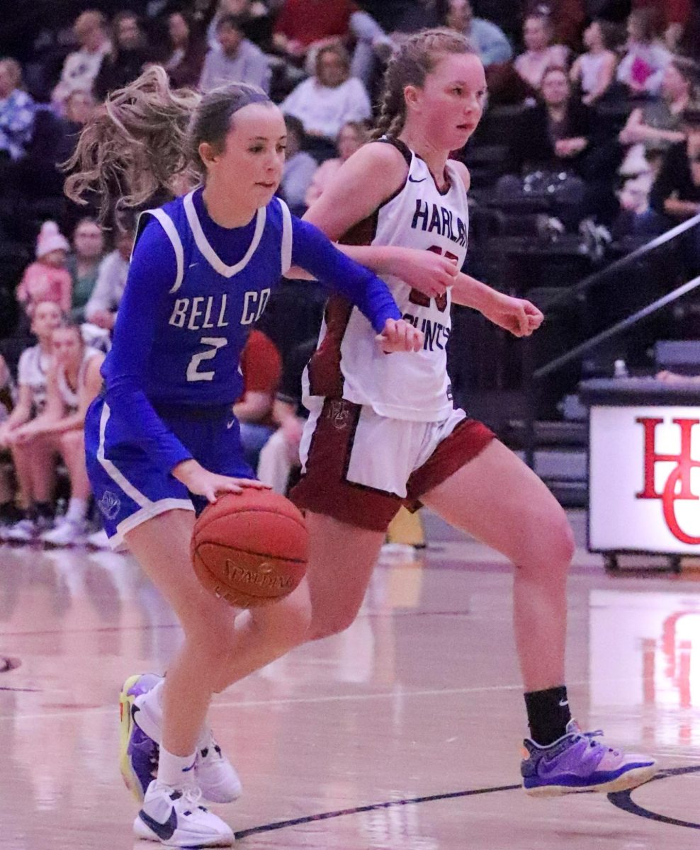 Harlan Countys Cheyenne Rhymer guarded Bell Countys Neveah Allen in Tuesdays game. Rhymer scored 13 points and grabbed nine rebounds in Harlan Countys win.