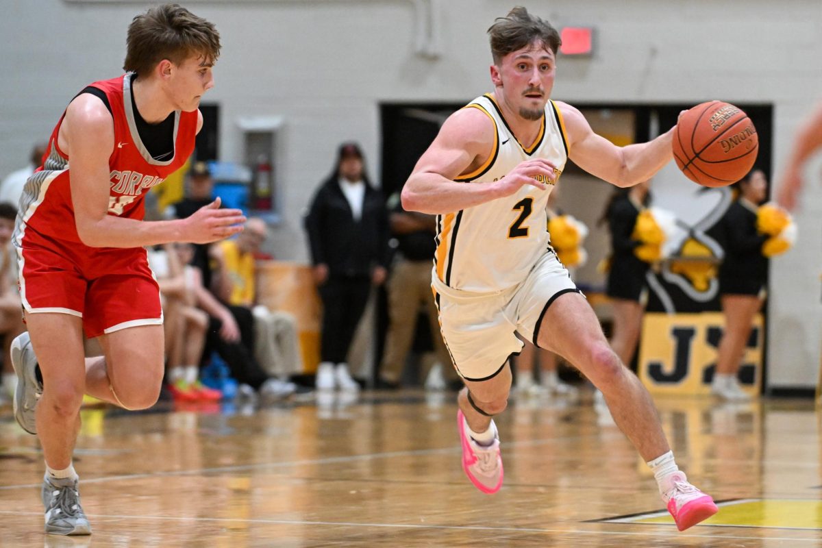 Senior guard Cayden Grigsby led a fast break for Middlesboro in the regular-season finale Friday against Corbin. Grigsby led the Jackets with 18 points in a 73-48 loss.
