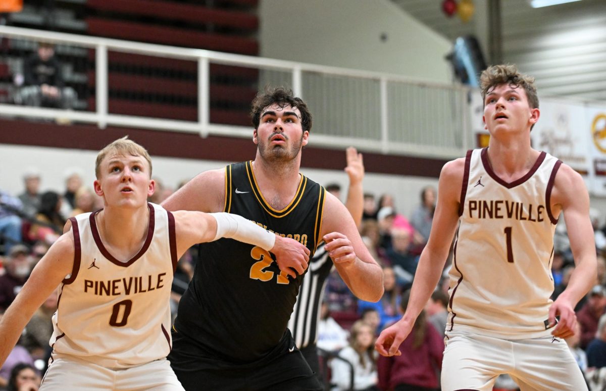 Pinevilles Sawyer Thompson (0) and Ashton Moser and Middlesboros Trey KIng wait for a rebound in Thursdays game. Moser scored 31 points and Thompson added 28 to lead the Lions to a 60-59 win. King led the Jackets with 32 points.