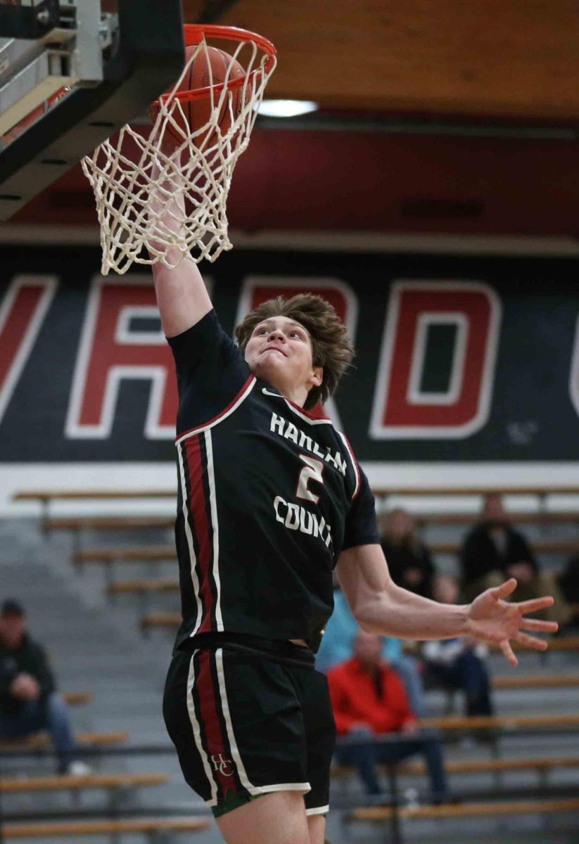 Harlan County senior Trent Noah slammed home two of his 34 points on Thursday in the Black Bears 85-73 win at Whitley County.