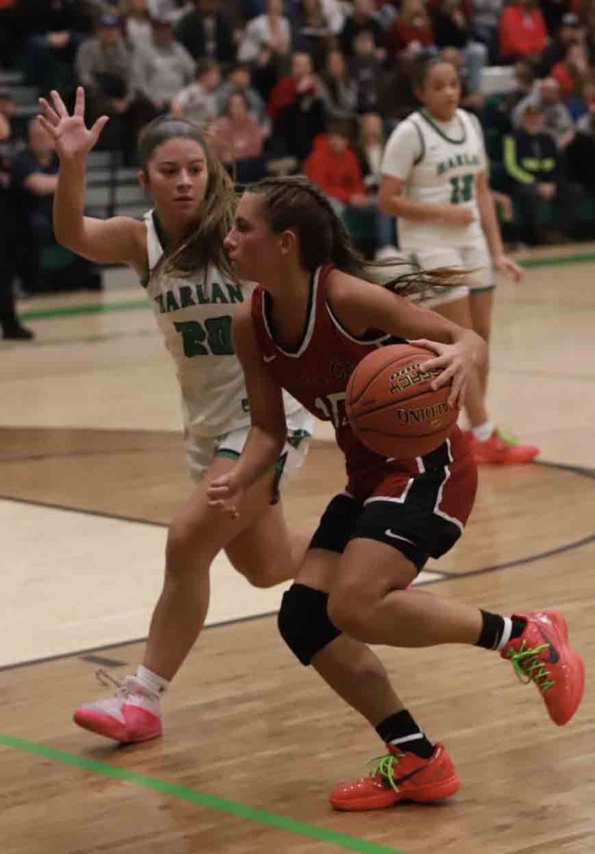 Harlan County guard Ella Karst worked against Harlans Emma Owens in Fridays game. Karst led the Lady Bears with 29 points in a 54-46 loss.