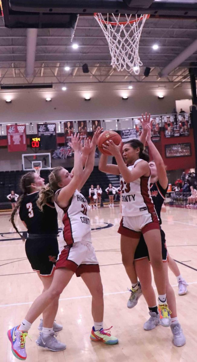 Harlan County senior forward Paige Phillips pulled down one of her eight third-quarter rebounds on Tuesday in the Lady Bears’ win over Lynn Camp. Phillips finished with 18 points and 11 rebounds.