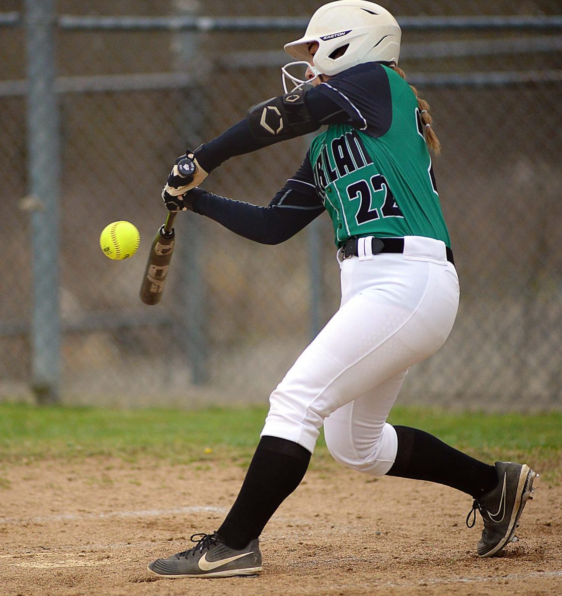 Junior third baseman Ella Lisenbee pounded out two triples as Harlan fell 12-4 at Claiborne, Tenn., on Tuesday.