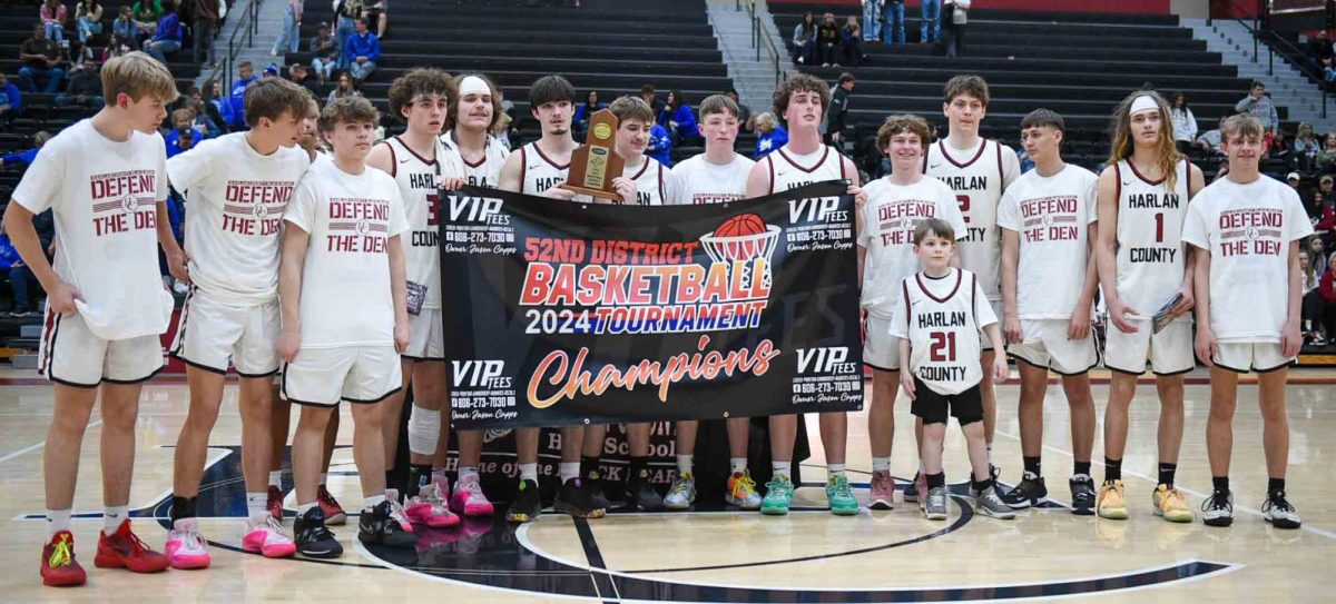 The Harlan County Black Bears are pictured after defeating Bell County 77-54 on Friday for their second straight 52nd District Tournament title and ninth in the 16-year history of the school.