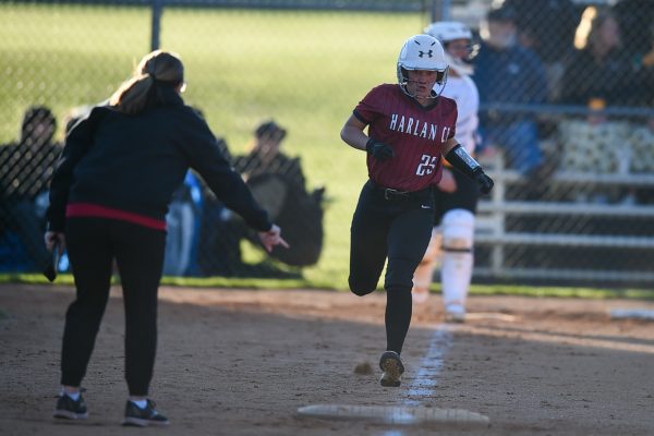Harlan County catcher Jade Burton headed to first base after one of her two hits Thursday in the Lady Bears 7-3 win at Middlesboro.