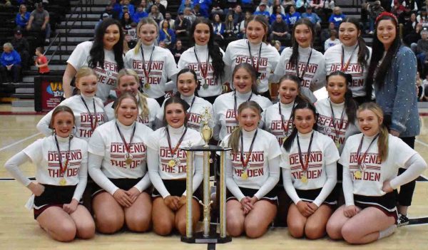 The Harlan County High School cheerleaders are pictured after winning the 52nd District Tournament cheer competition.