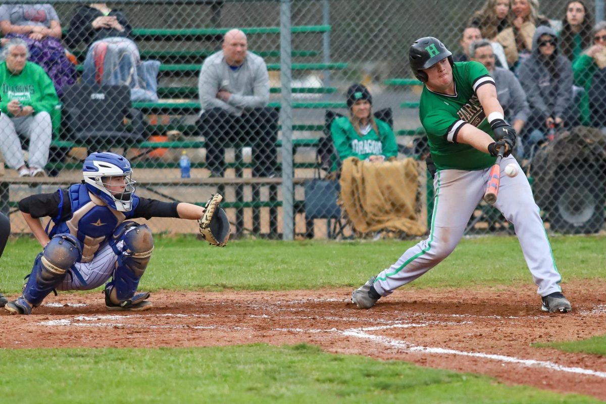 Harlans Jared Moore connected on a pitch in 13th Region All A Classic action Wednesday. Moore had a hit in the Green Dragons 4-1 win.