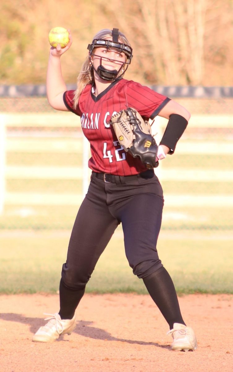 Harlan County shortstop Rylie Maggard made the throw to first during the Lady Bears season-opening game Tuesday. The visiting Lady Eagles won 3-0.