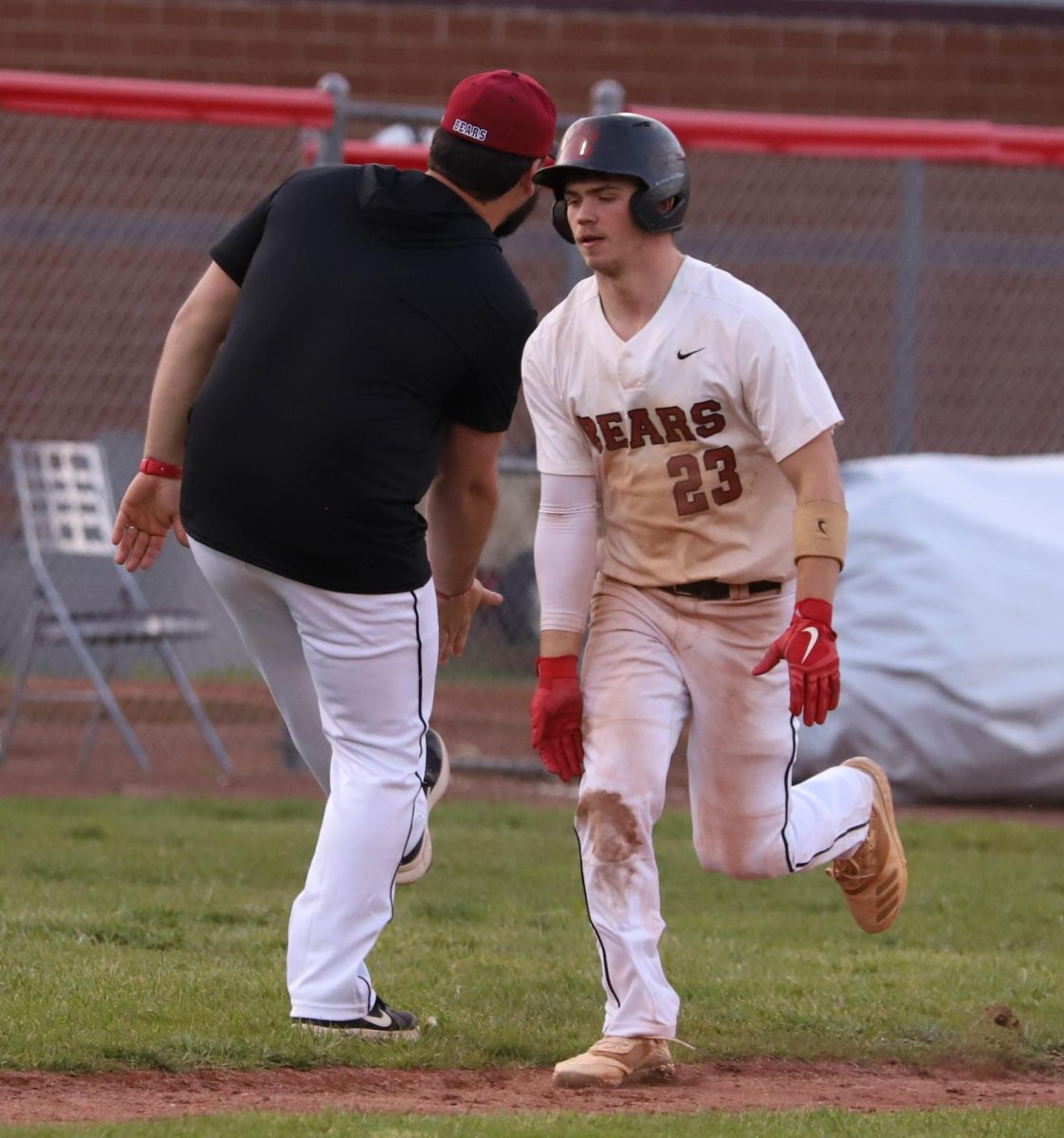 Harlan+Countys+Jonah+Swanner+was+congratulated+by+HCHS+coach+Scotty+Bailey+after+his+homer+in+the+fifth+inning+of+the+Bears+3-0+win+Monday+over+visiting+Lee%2C+Va.