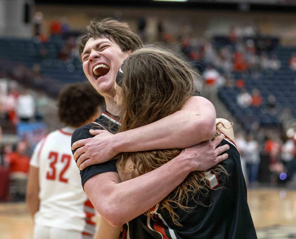 Harlan+County+guards+Trent+Noah+%28left%29+and+Reggie+Cottrell+celebrated+after+the+Black+Bears+completed+a+62-48+win+over+Corbin+for+the+13th+Region+Tournament+title+and+a+trip+to+Rupp+Arena+for+the+state+tournament.