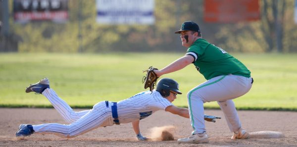 Bell Countys Holden Clark stretched back to first base ahead of the throw to Jared Moore in Mondays district clash. The Bobcats scored twice in the seventh inning to win 4-3.