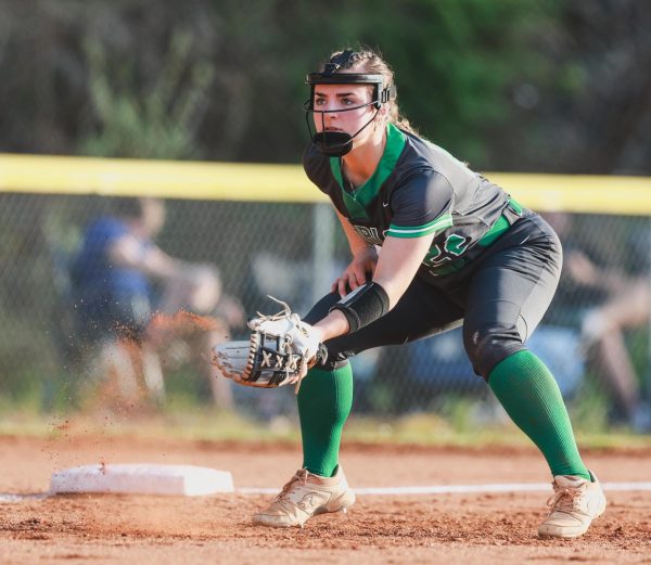 Harlan third baseman Ella Lisenbee homered Monday in the Lady Dragons 11-1 win at Barbourville.