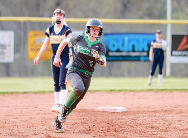 Harlans Jordyn Smith rounded second base during the Lady Dragons win Monday at Knox Central.