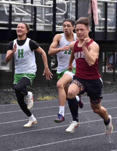 Harlan County junior Luke Kelly set a school record in winning the 100-meter dash on Saturday in the Area 9 meet.