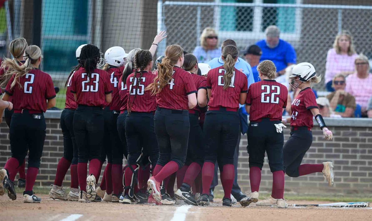Harlan+County+senior+Rylie+Maggard+was+greeted+at+the+plate+after+her+grand+slam+in+the+first+inning+of+the+Lady+Bears+13th+Region+Tournament+game+against+North+Laurel.+Harlan+County+grabbed+an+early+5-0+lead+before+North+pulled+away+to+win+22-5.