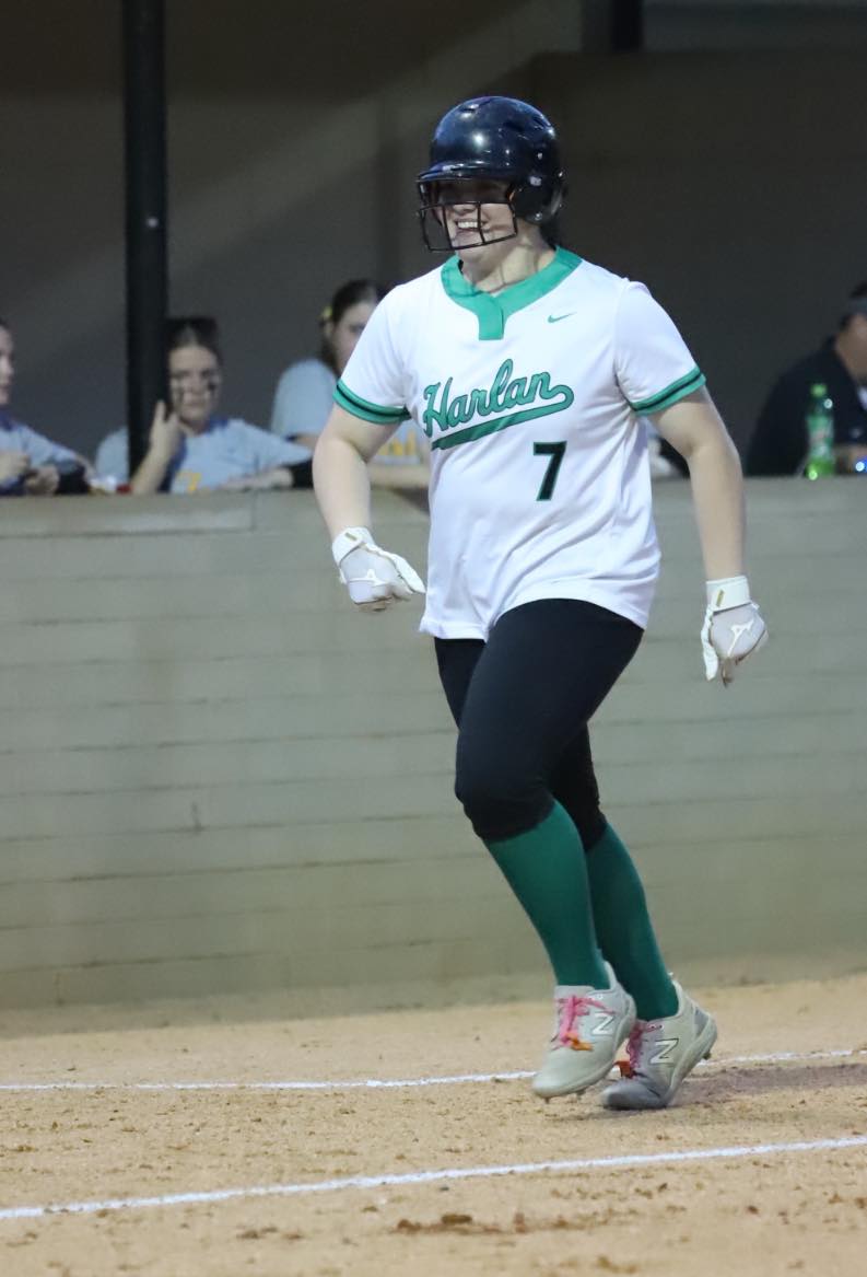 Harlan first baseman Abbi Fields headed home after hitting one of her two home runs Monday in the Lady Dragons 6-5 win over Middlesboro in the 52nd District Tournament.