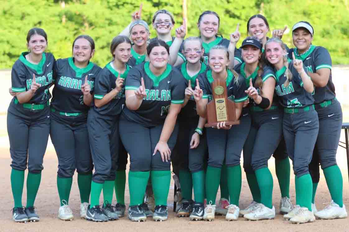 The Harlan Lady Dragons captured the 52nd DIstrict Tournament title with a 4-3 win Tuesday over Harlan County. Team members include, from left, front row: Rhileigh Estes, Gracie Hensley, Taylor Glenn, Ally Kirby, Jordyn Smith, Mallory McNiel, Ella Lisenbee and Ella Farley; back row: Lacey Lemar, Addison Jackson, Abbi Fields, Ava Nunez and Sariah Pace.