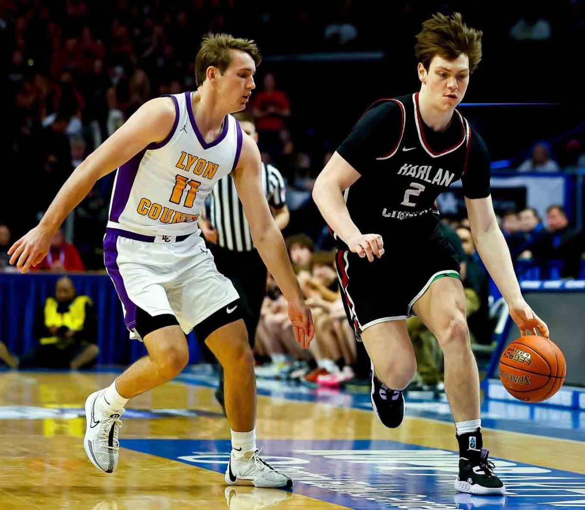 Harlan+County+guard+brought+the+ball+down+the+court+against+Lyon+Countys+Travis+Perry+in+the+state+championship+game+last+month.+Both+Noah+and+Perry%2C+the+states+top+two+players+in+the+Class+of+2024%2C+will+play+at+the+University+of+Kentucky+next+season.