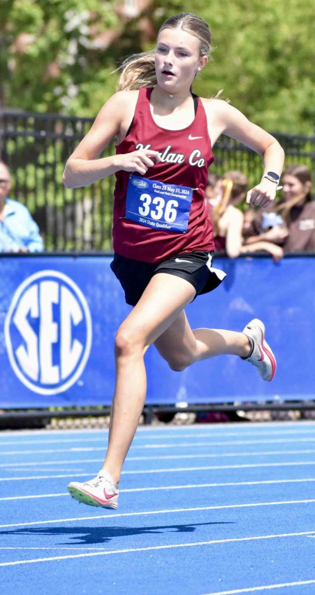 Harlan County eighth grader Lauren Lewis finished sixth in the 400-meter dash at the 2A state track meet Friday, setting a new school record in the process.