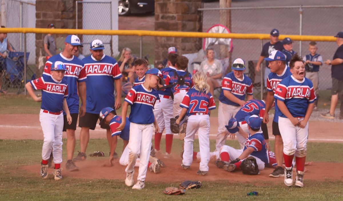 The Harlan All Stars celebrated after a 9-5 win Tuesday over Knox County at Benham to earn a berth in the District 4 final four.