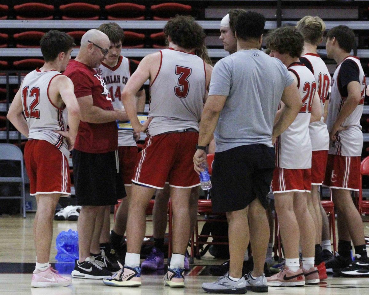 Harlan County coach Kyle Jones talked to the Black Bears during a timeout earlier this summer at South Laurel. The defending 13th Region champs will close their summer schedule this weekend in Shelbyville at the Titans/Rockets Shootout.