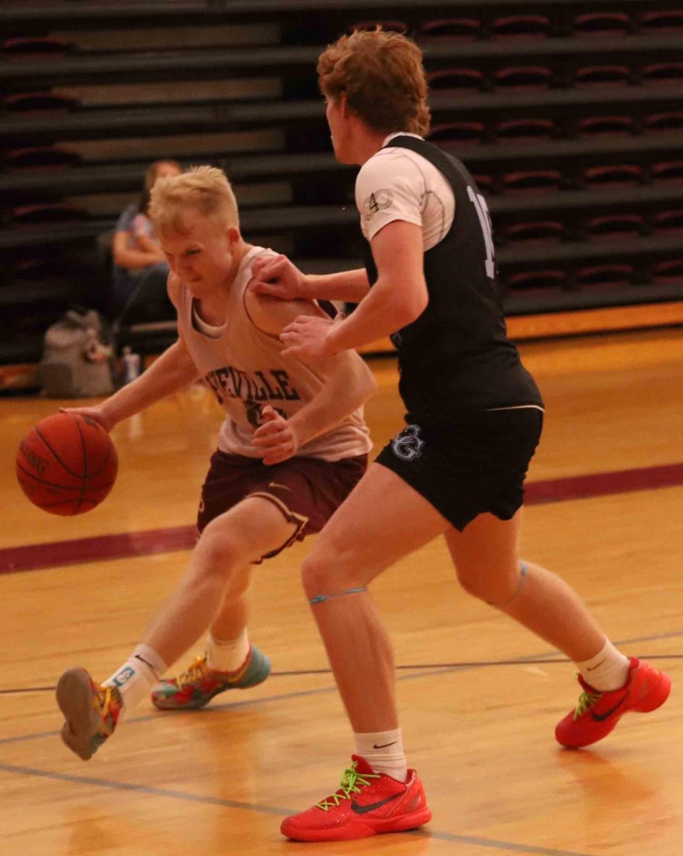 Pineville senior guard Sawyer Thompson, one of the 13th Regions top players, worked to the basket in summer basketball action earlier this month.