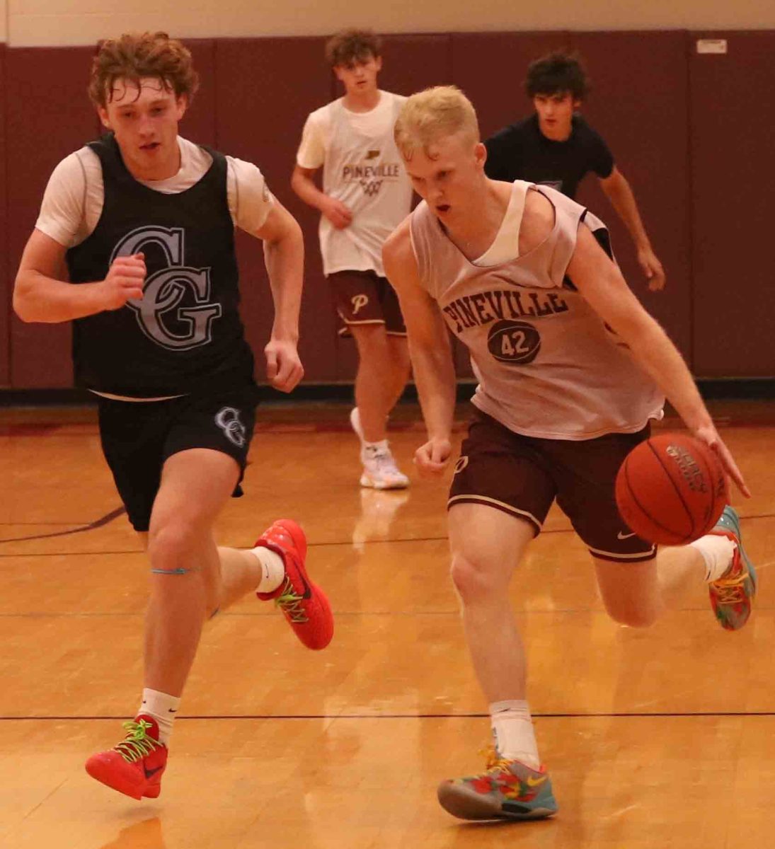 Photo by John Henson
Pineville guard Sawyer Thompson worked to the basket in summer action Tuesday. The 13-1 Lions close summer play this weekend in the Titans/Rockets Shootout.