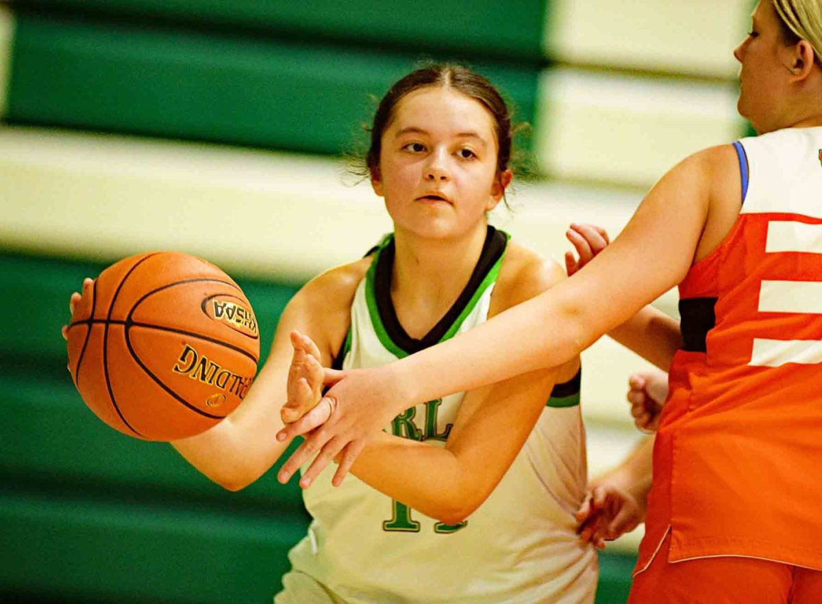 Harlan forward Clarissa Yost worked to the basket in action earlier this season. The Lady Dragons fell 43-21 on Monday at Pineville.