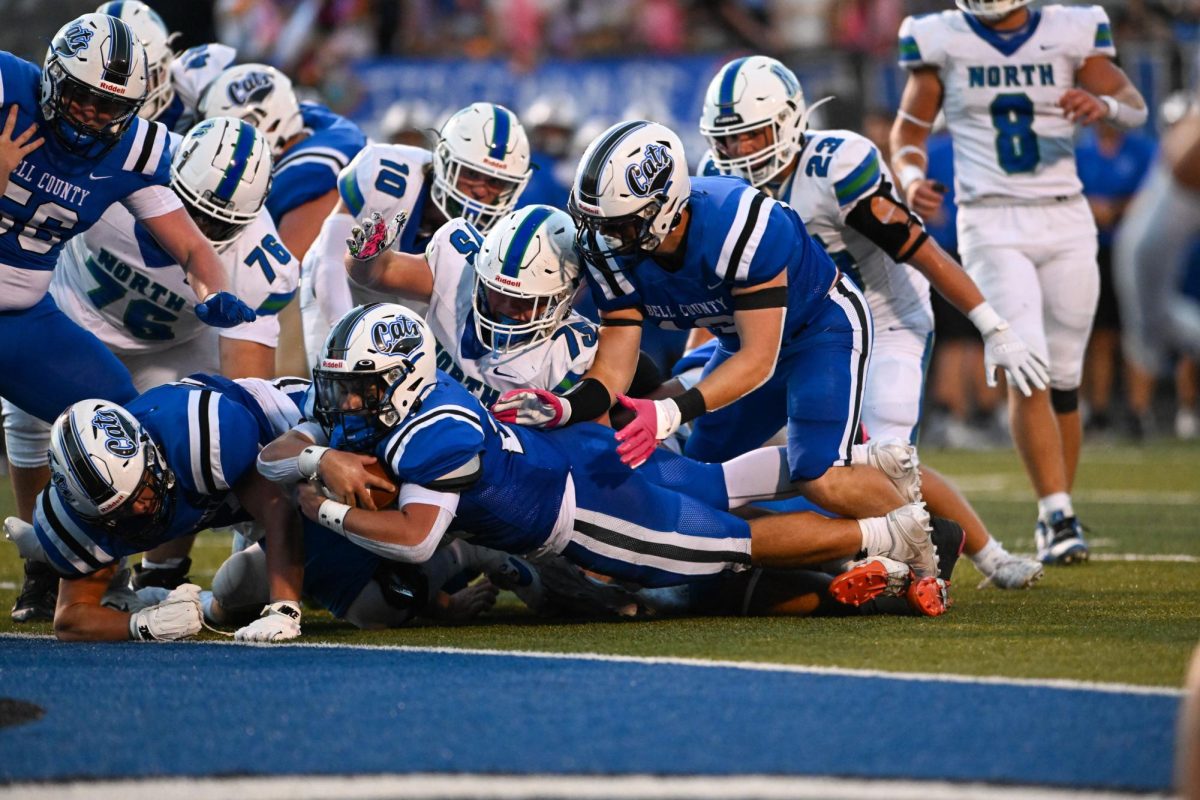 Bell County junior running back Kaleb Miller went into the end zone on a 1-yard touchdown run in the second quarter of Friday's season-opening game on Log Mountain. Miller scored two touchdowns in the Bobcats' 24-22 loss.