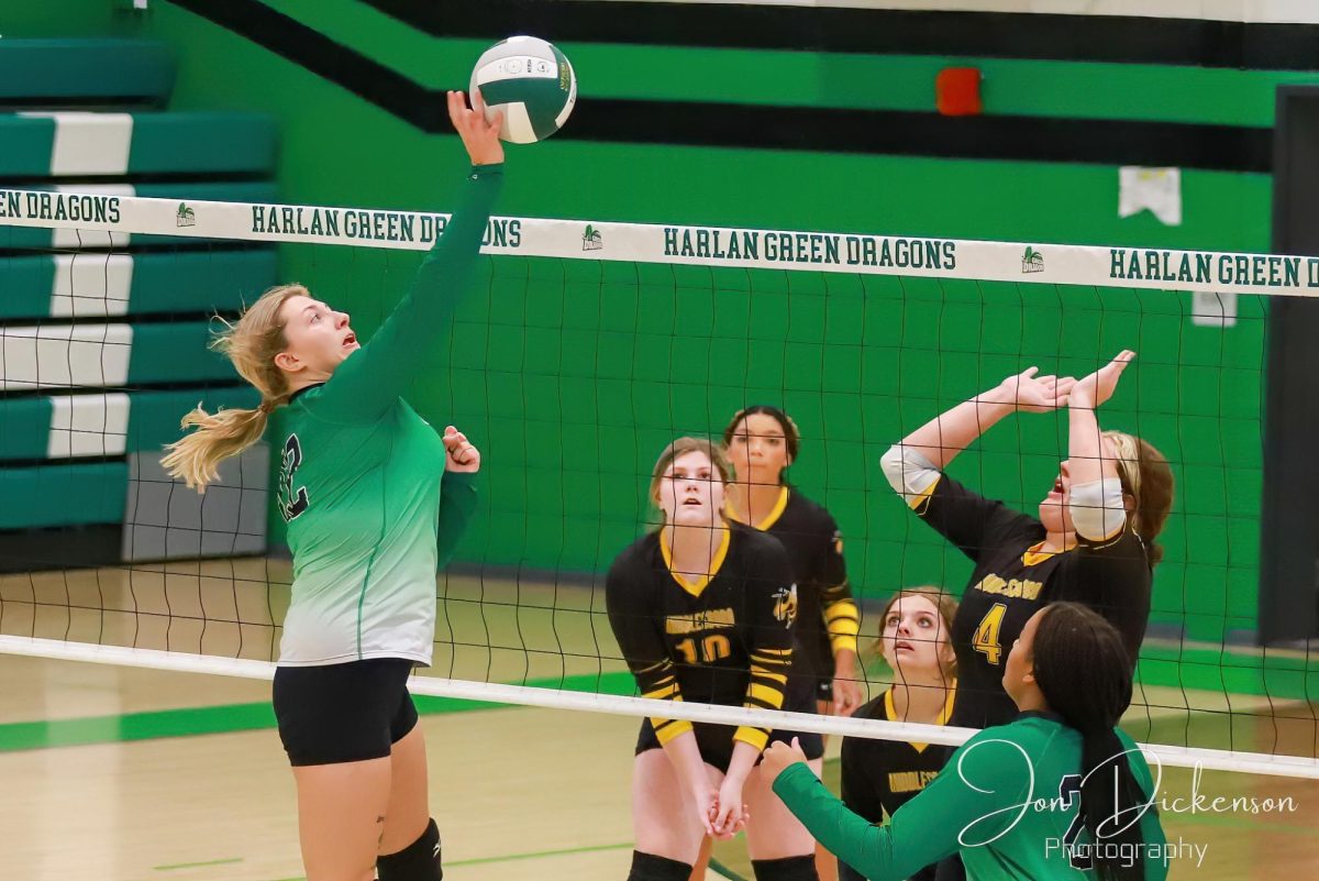 Harlan's Annie Hoskins went up for a point in Tuesday's district clash against Middlesboro.