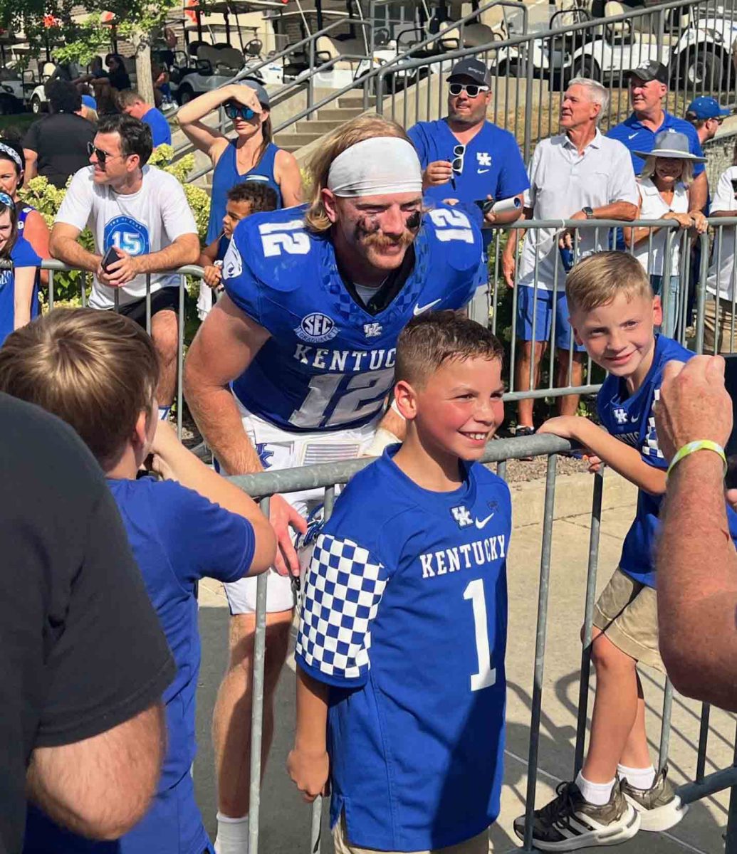 UK junior quarterback Brock Vandagriff interacting with young fans following a 41-6 non-conference victory by the Wildcats over Ohio University. Vandagriff completed 17 of his 24 pass attempts en route to throwing for 237 yards.