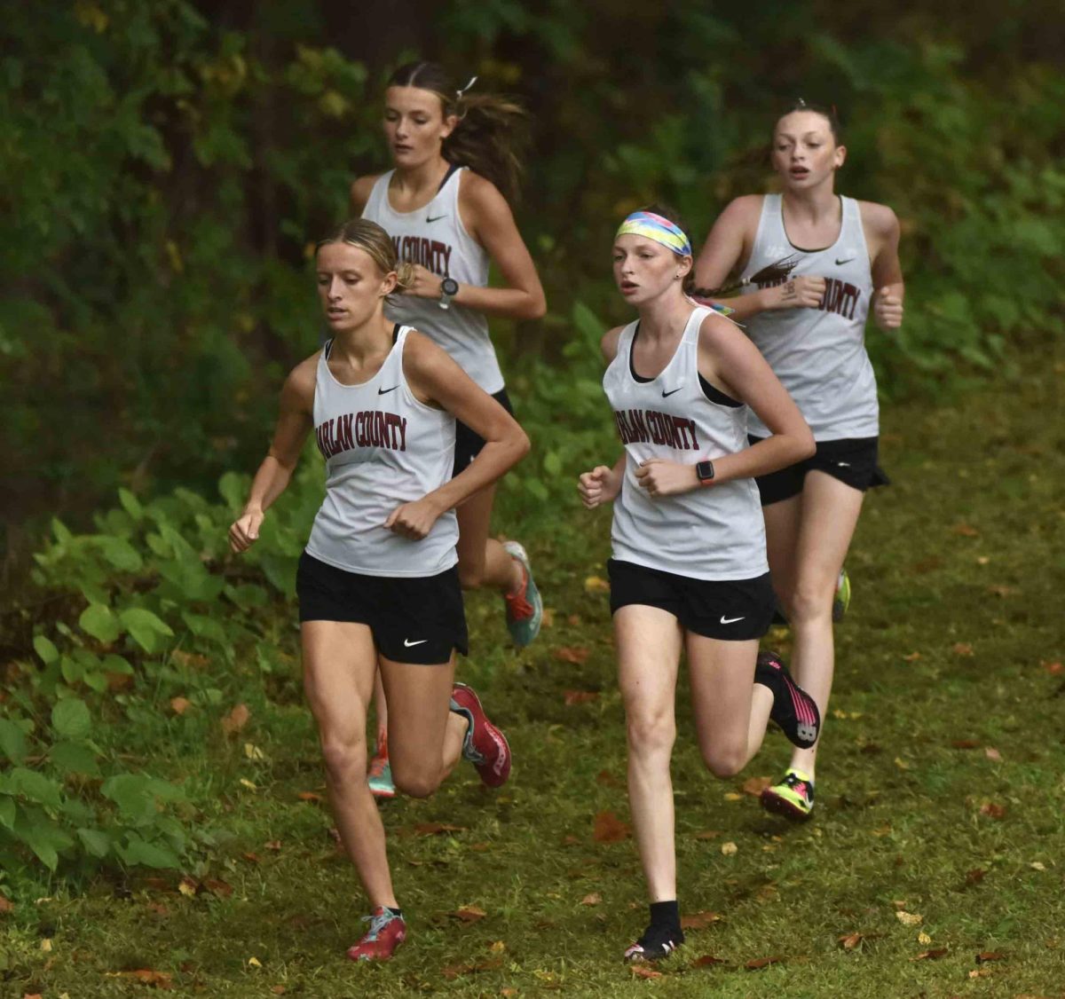 Another strong performance by Harlan County runners Peyton Lunsford, Lauren Lewis, Kiera Roberts and Gracie Roberts helped the Lady Bears claim their fourth straigh team title on Tuesday at their home course.