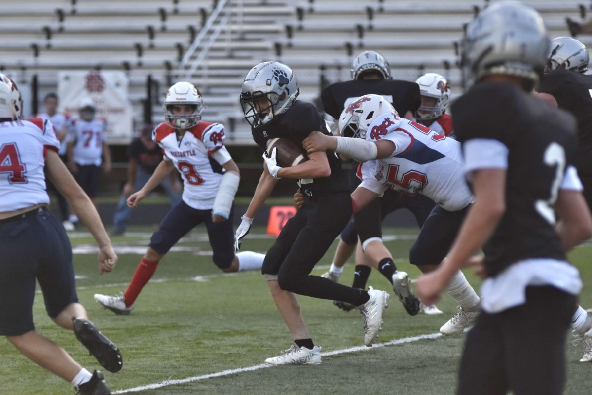 Harlan County running back. Cayson Farley worked through the Rockcastle County defense in middle school football action Saturday afternoon. The Bears fell 14-0 in the eighth-grade game and 36-0 in sixth-grade action.