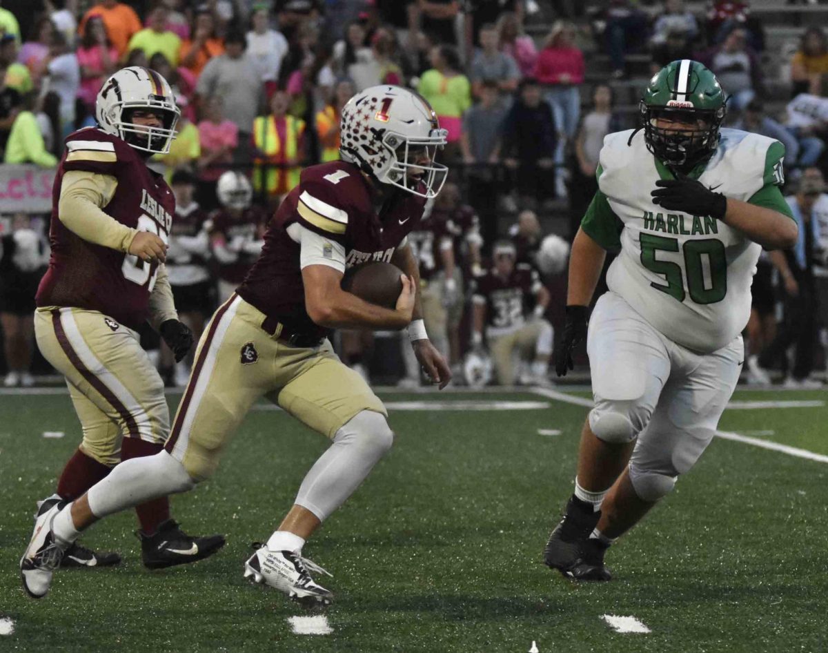 Leslie County senior quarterback Landry Collett ran for one touchdown and passed for two in the Eagles' 35-6 win Friday over visiting Harlan.