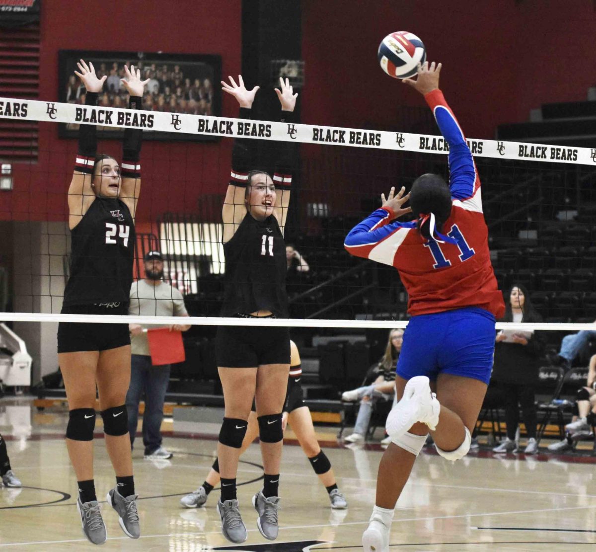 Harlan County's Madilynn Nolan and Kylee Hoiska went up for a block during the Lady Bears' win Tuesday over Jackson County.