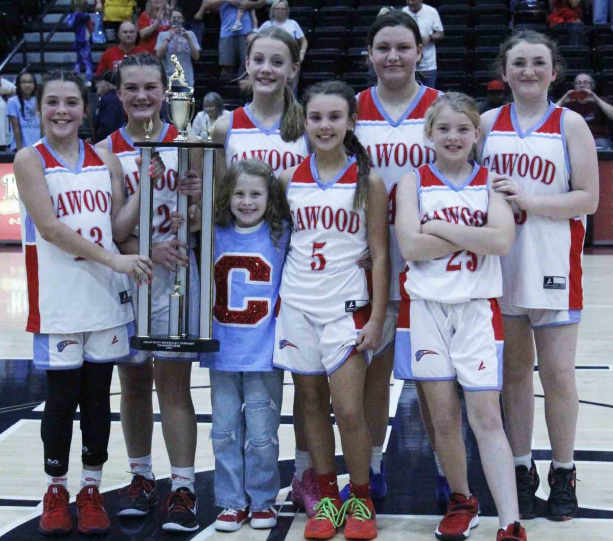 The Cawood Lady Comets captured the fifth- and sixth-grade county tournament title with a 28-26 win Tuesday over Rosspoint. Team members include, from left, front row: manager Caroline Wilson, Natalie Charles and Brylee Helton; back row: Campbell Thompson, Bella Ford, Addy Cochran, Katie Napier and Lilith Smith.