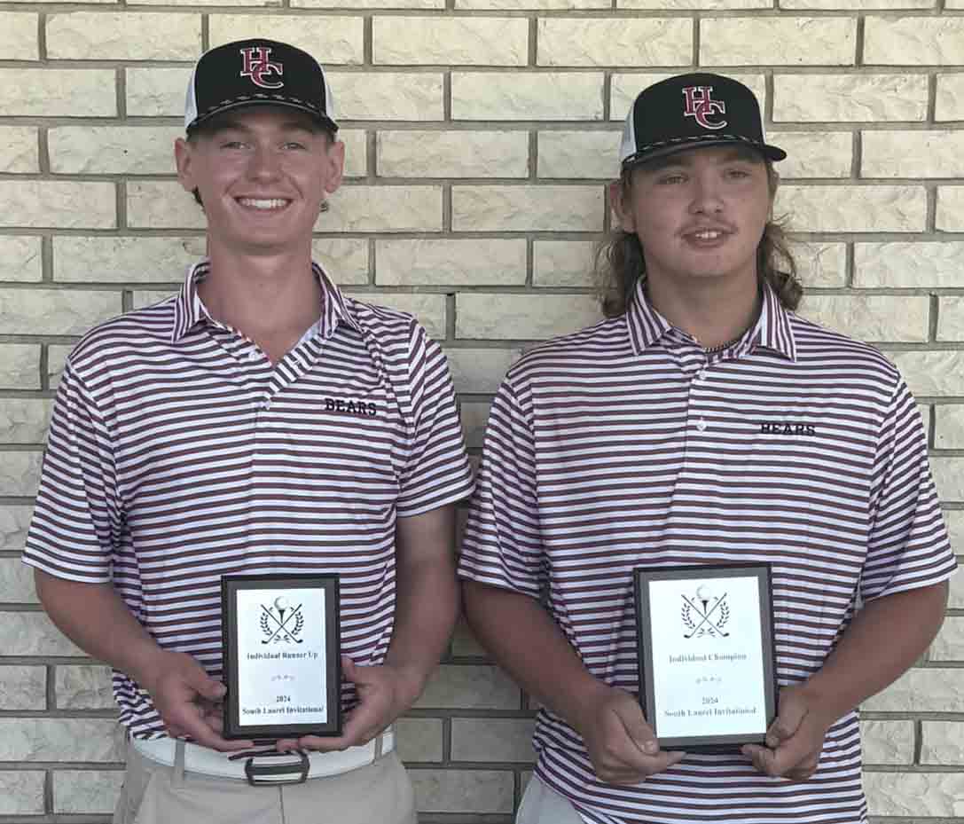 Harlan County golfers Cole Cornett (left) and Brayden Casolari took the top two spots Saturday in the South Laurel Invitational. The 18-hole tourname nt at the London Country Club featured 84 high school players. Casolari was first with a three-over par 74, one stroke ahead of Cornett.