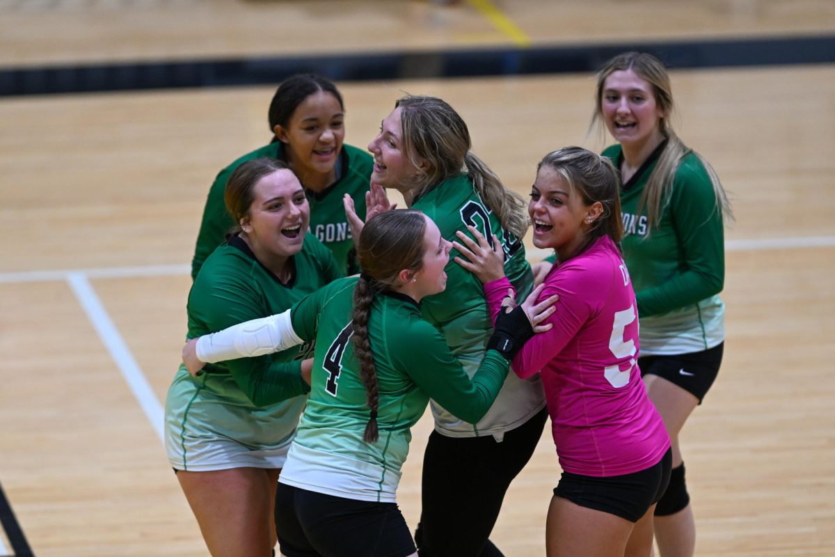 The Harlan Lady Dragons celebrated a five-set win Tuesday at Middlesboro to avenge an earlier loss.